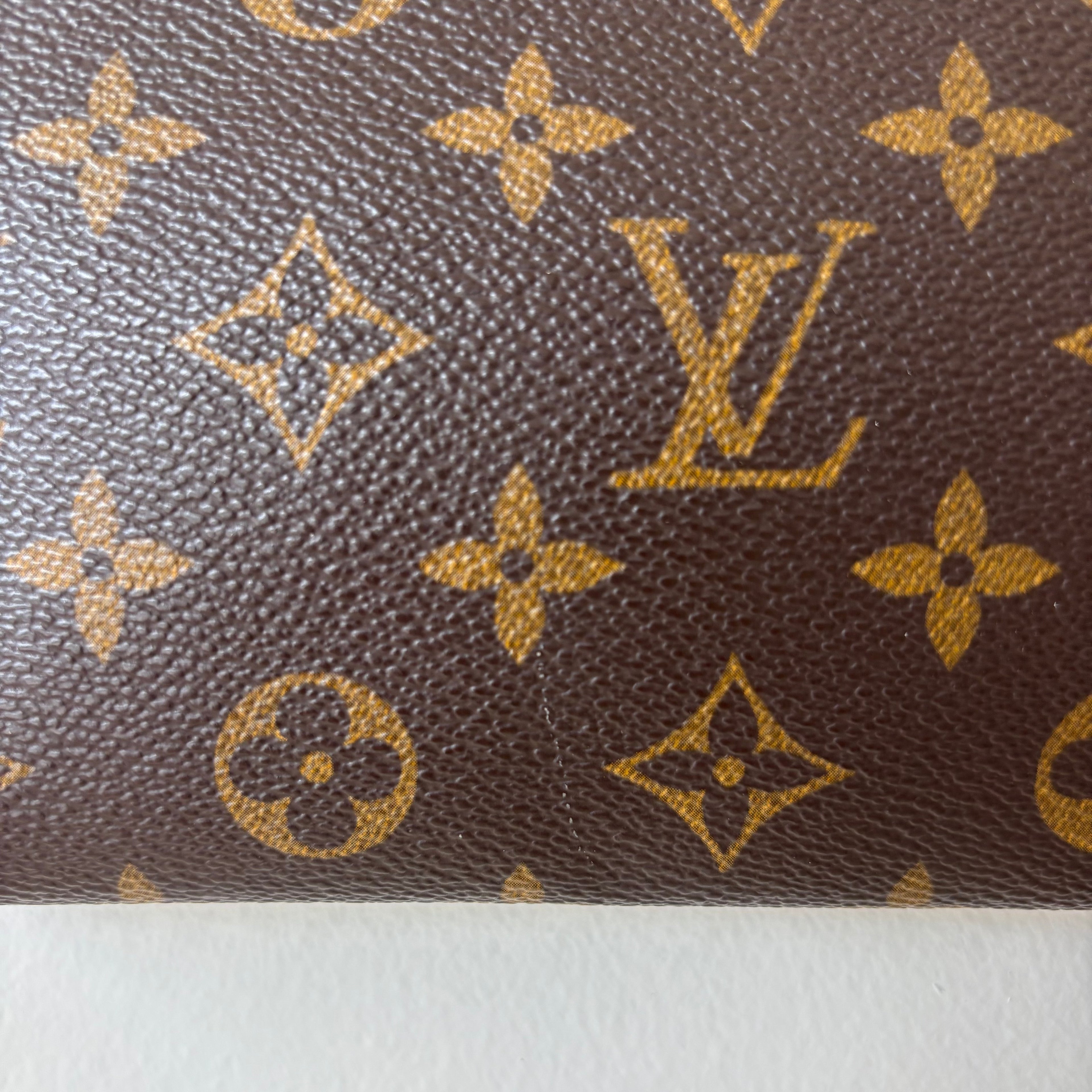 Monogram Bucket GM Pouch Accessory Pouch