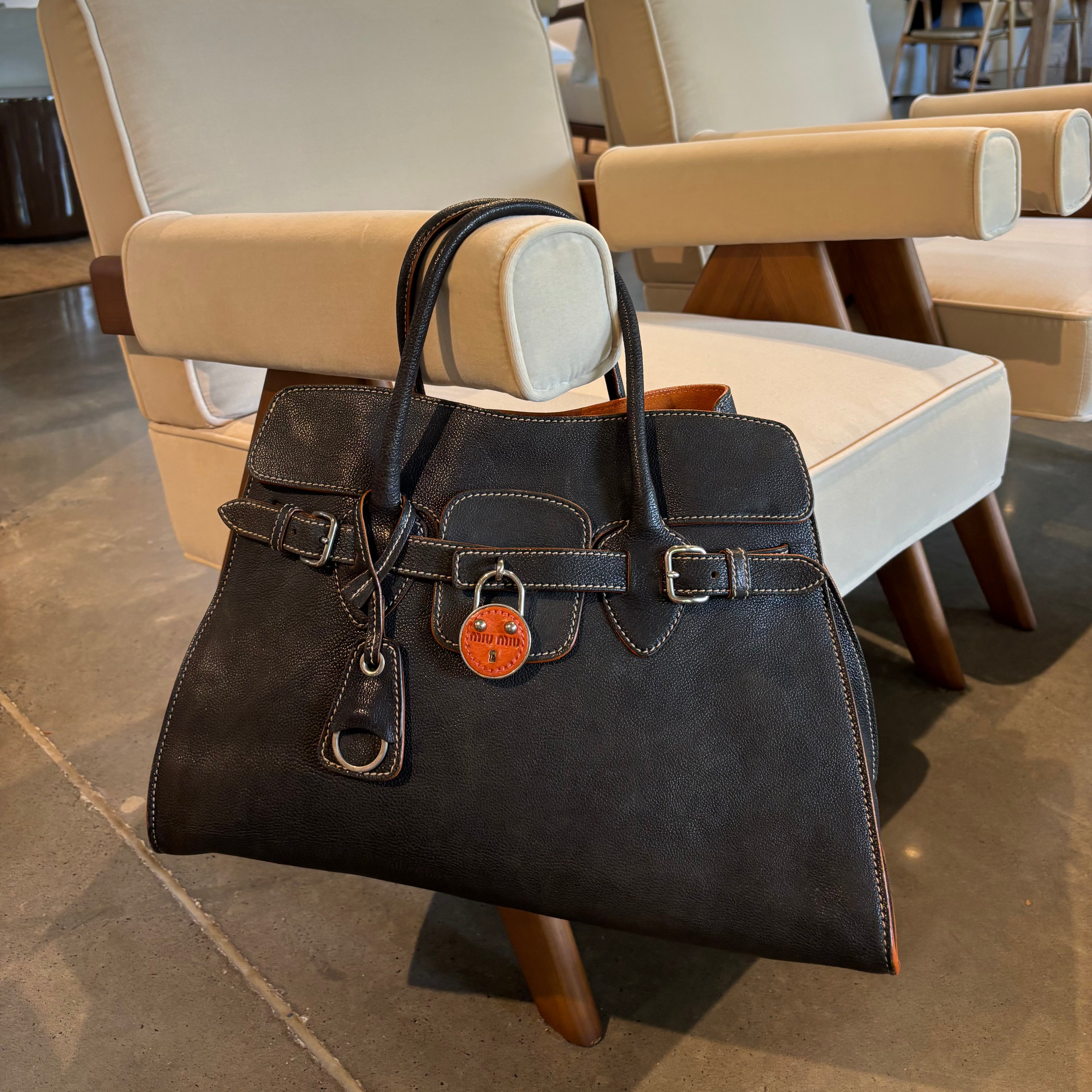 Early 2000s Miu Miu Leather Handbag — Black, Burnt Orange Suede Interior, Padlock & Clochette
